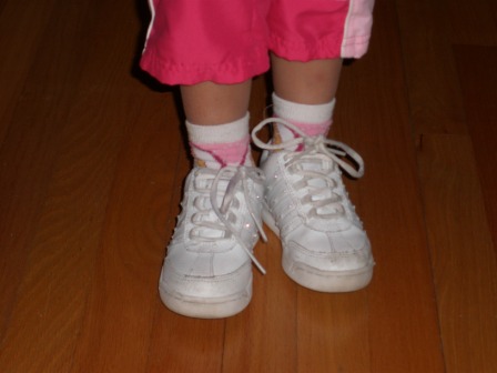 Kasen showing off the shoes she tied (close-up)